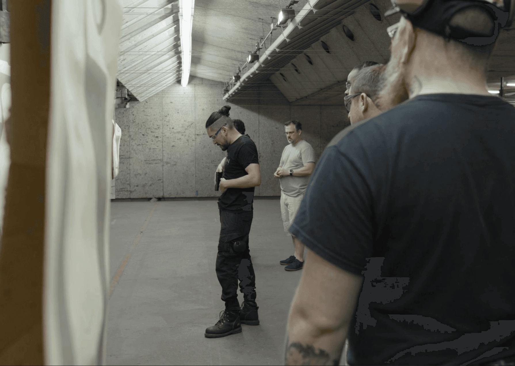 instructor demonstrating in the range